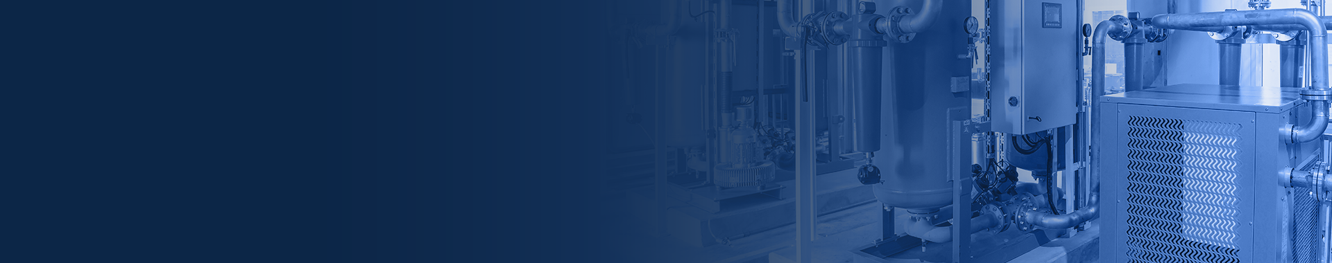 Wide banner depicting compressed air equipment in a factory with dark blue overlay